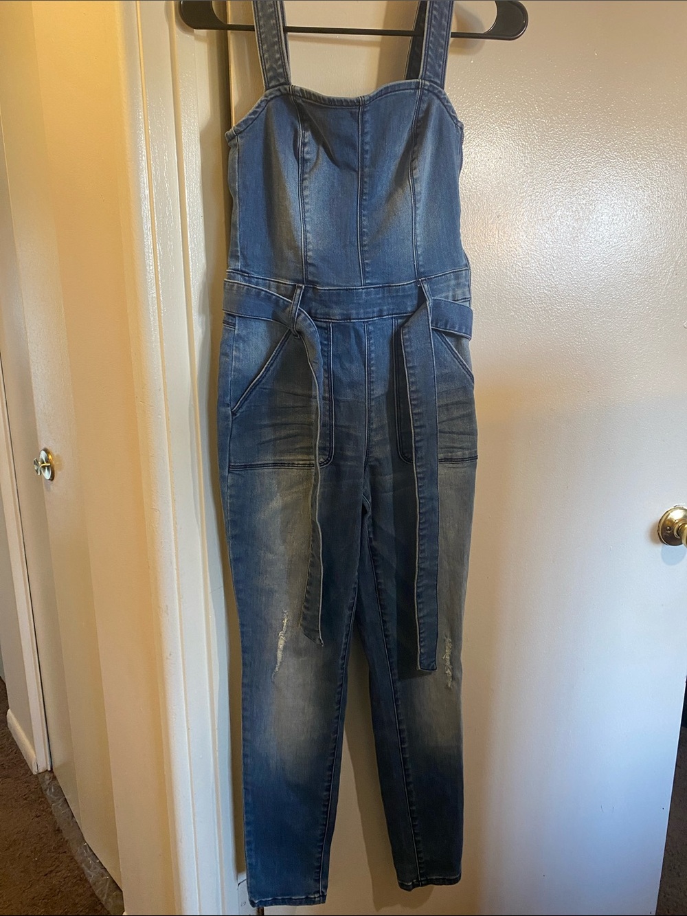 bebe Washed Blue Denim Jumpsuit with Self-Tie Waist